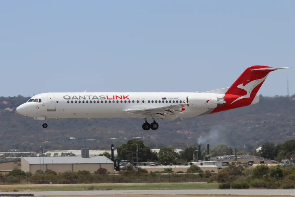 VH-NHC F100 NWK
